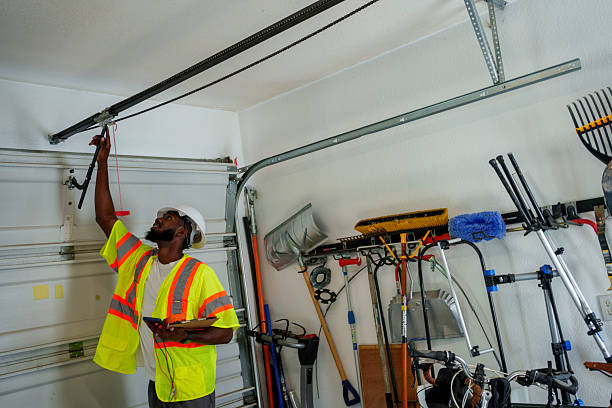 Professional Garage Door Panel Replacement technician working in North Fork, AZ